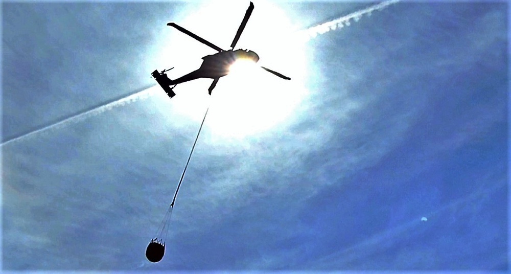 Federal, state agencies partner for fire-suppression training with Black Hawks at Fort McCoy