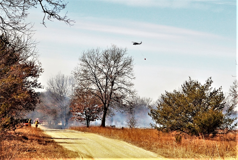 Federal, state agencies partner for fire-suppression training with Black Hawks at Fort McCoy