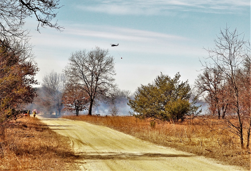 Federal, state agencies partner for fire-suppression training with Black Hawks at Fort McCoy