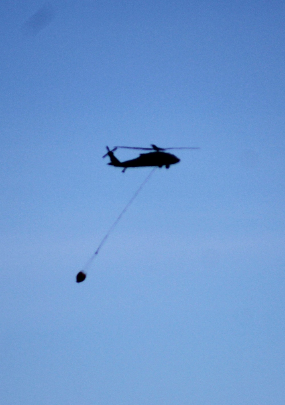 Federal, state agencies partner for fire-suppression training with Black Hawks at Fort McCoy