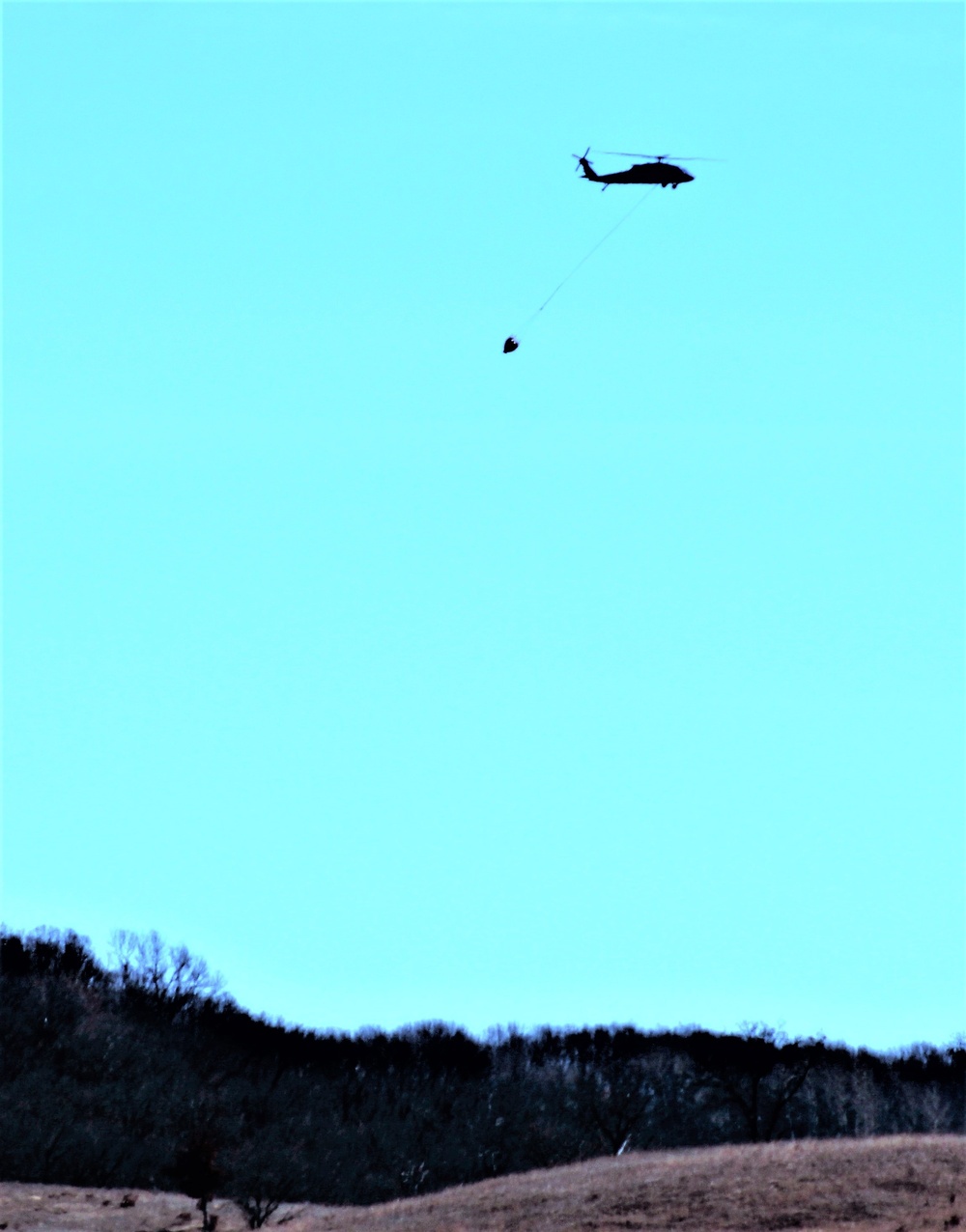Federal, state agencies partner for fire-suppression training with Black Hawks at Fort McCoy