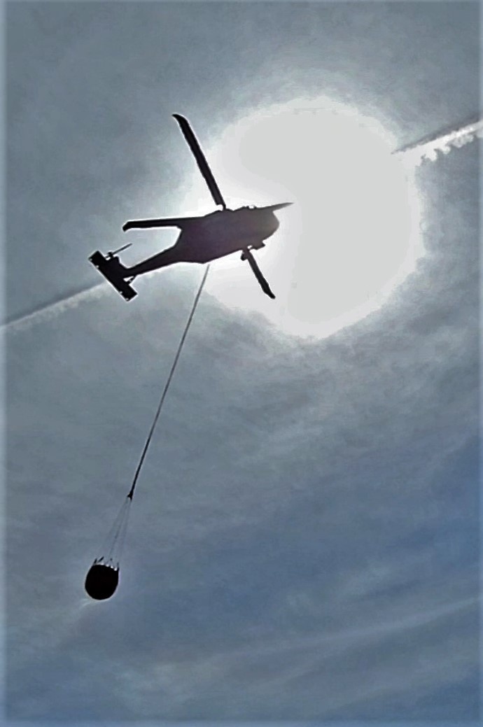 Federal, state agencies partner for fire-suppression training with Black Hawks at Fort McCoy