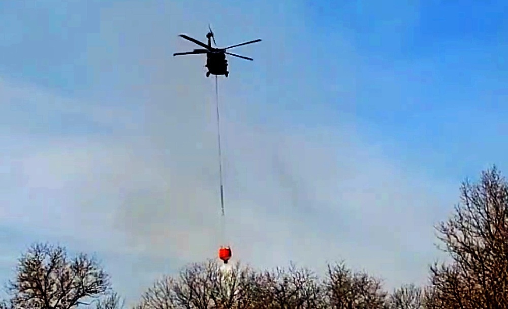 Federal, state agencies partner for fire-suppression training with Black Hawks at Fort McCoy