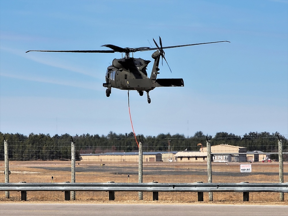 Federal, state agencies partner for fire-suppression training with UH-60 Black Hawks at Fort McCoy