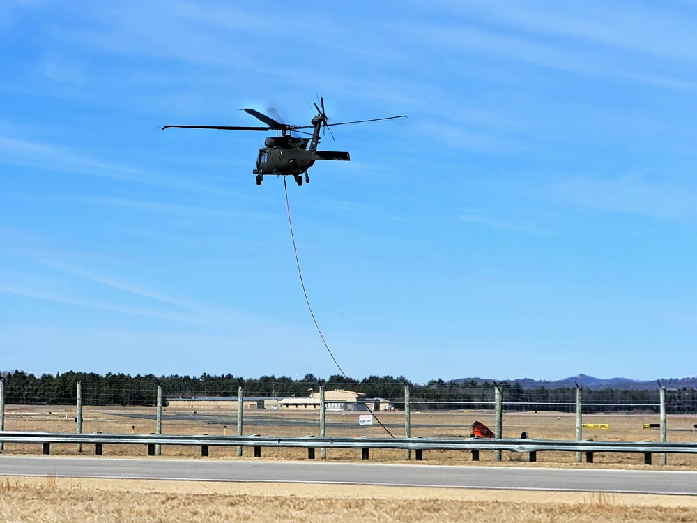 Federal, state agencies partner for fire-suppression training with UH-60 Black Hawks at Fort McCoy