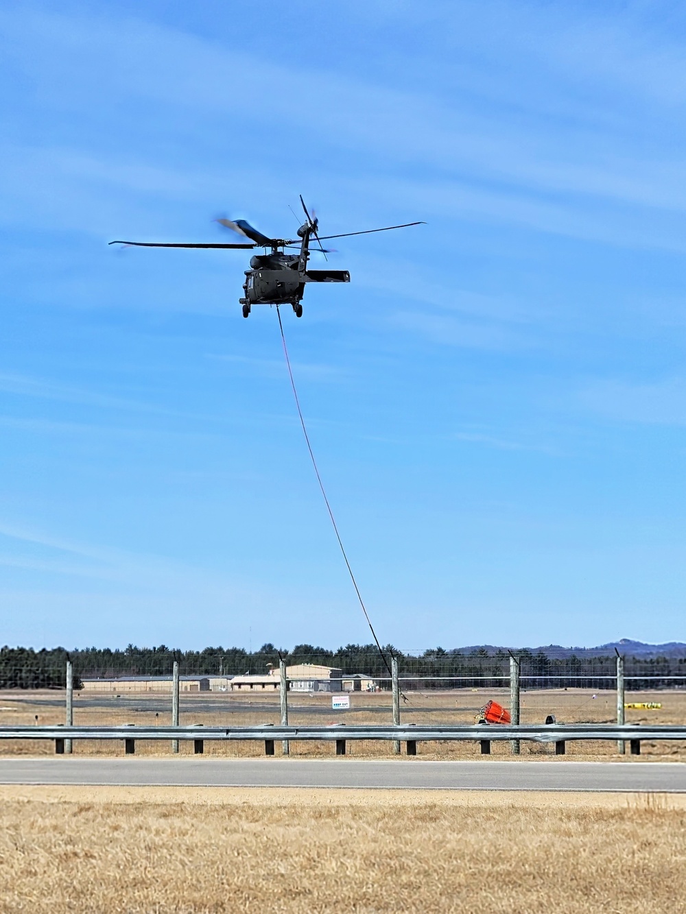 Federal, state agencies partner for fire-suppression training with UH-60 Black Hawks at Fort McCoy