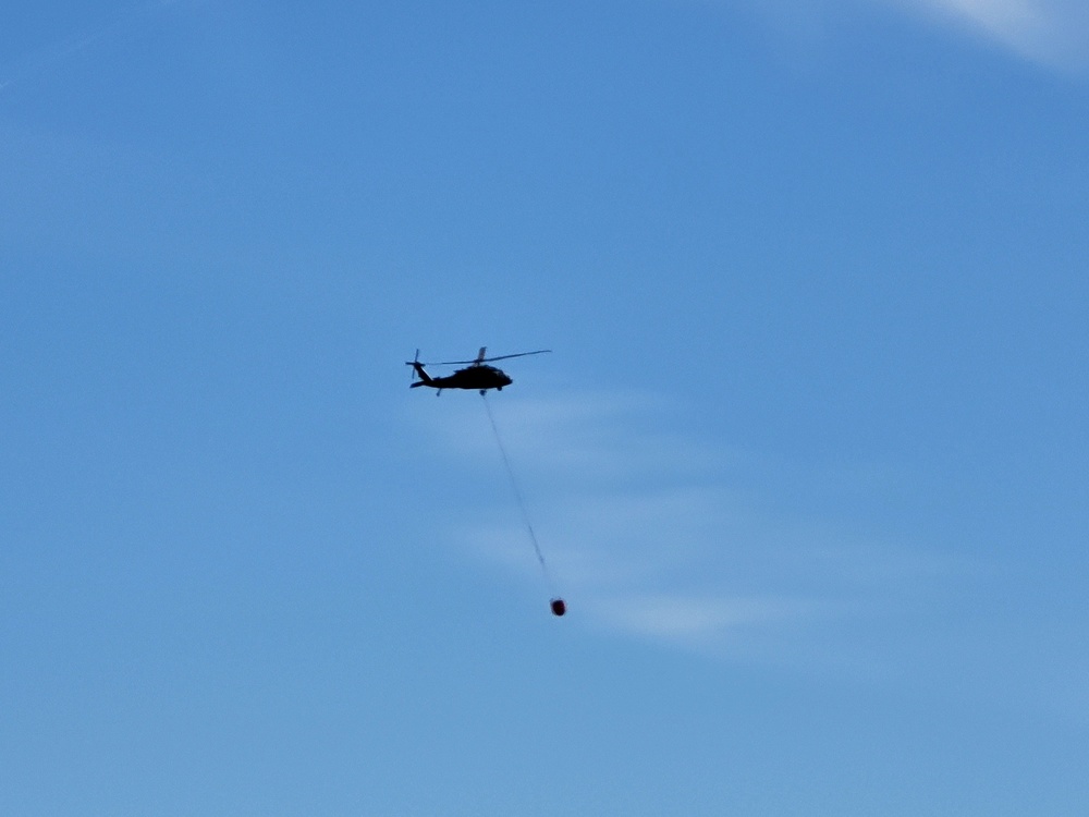 Federal, state agencies partner for fire-suppression training with UH-60 Black Hawks at Fort McCoy