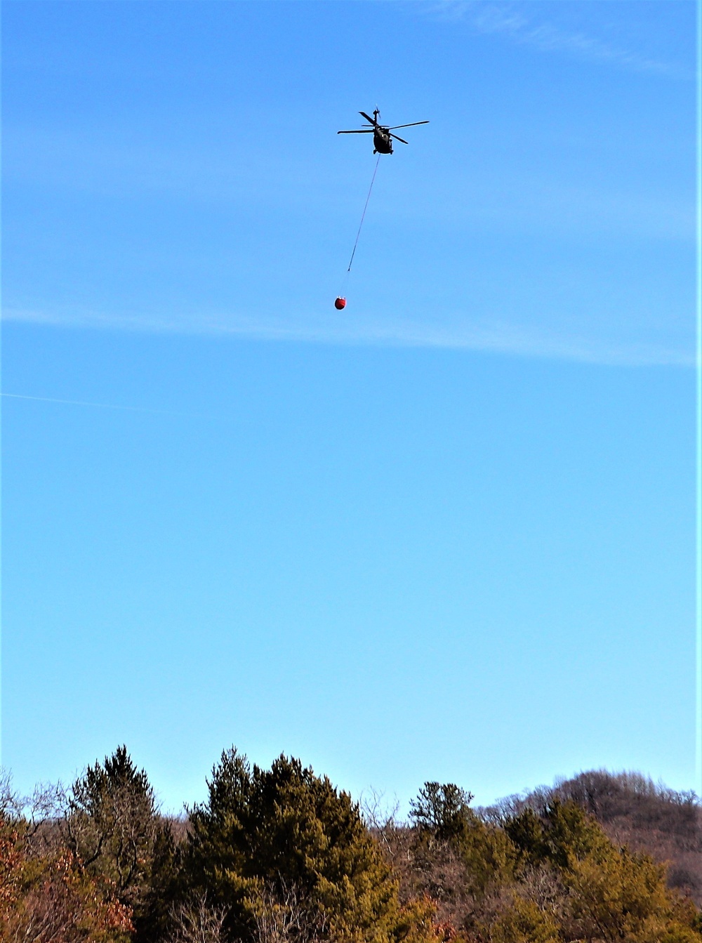 Federal, state agencies partner for fire-suppression training with UH-60 Black Hawks at Fort McCoy