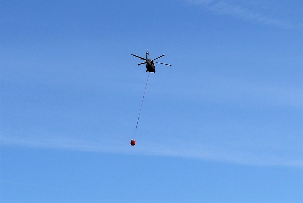 Federal, state agencies partner for fire-suppression training with UH-60 Black Hawks at Fort McCoy