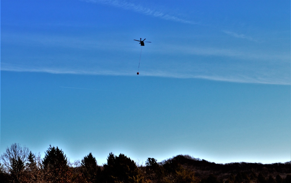 Federal, state agencies partner for fire-suppression training with UH-60 Black Hawks at Fort McCoy