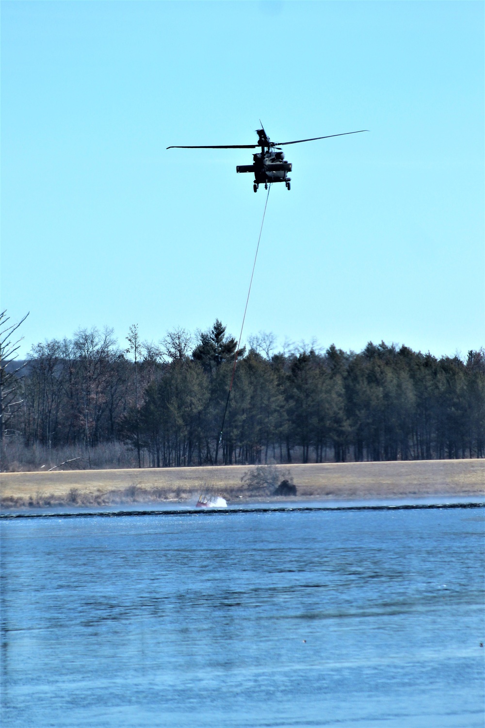 Federal, state agencies partner for fire-suppression training with UH-60 Black Hawks at Fort McCoy