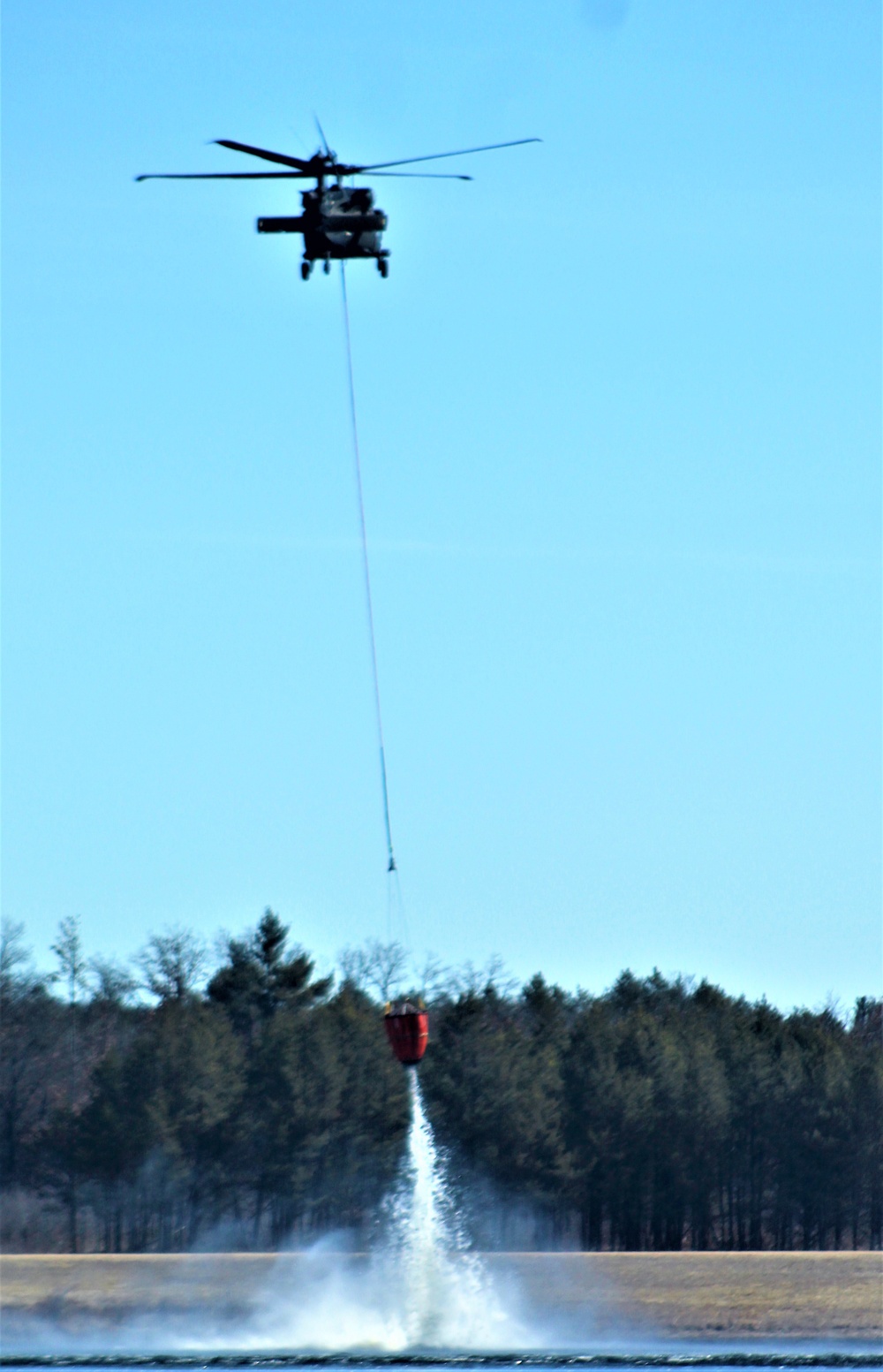 Federal, state agencies partner for fire-suppression training with UH-60 Black Hawks at Fort McCoy