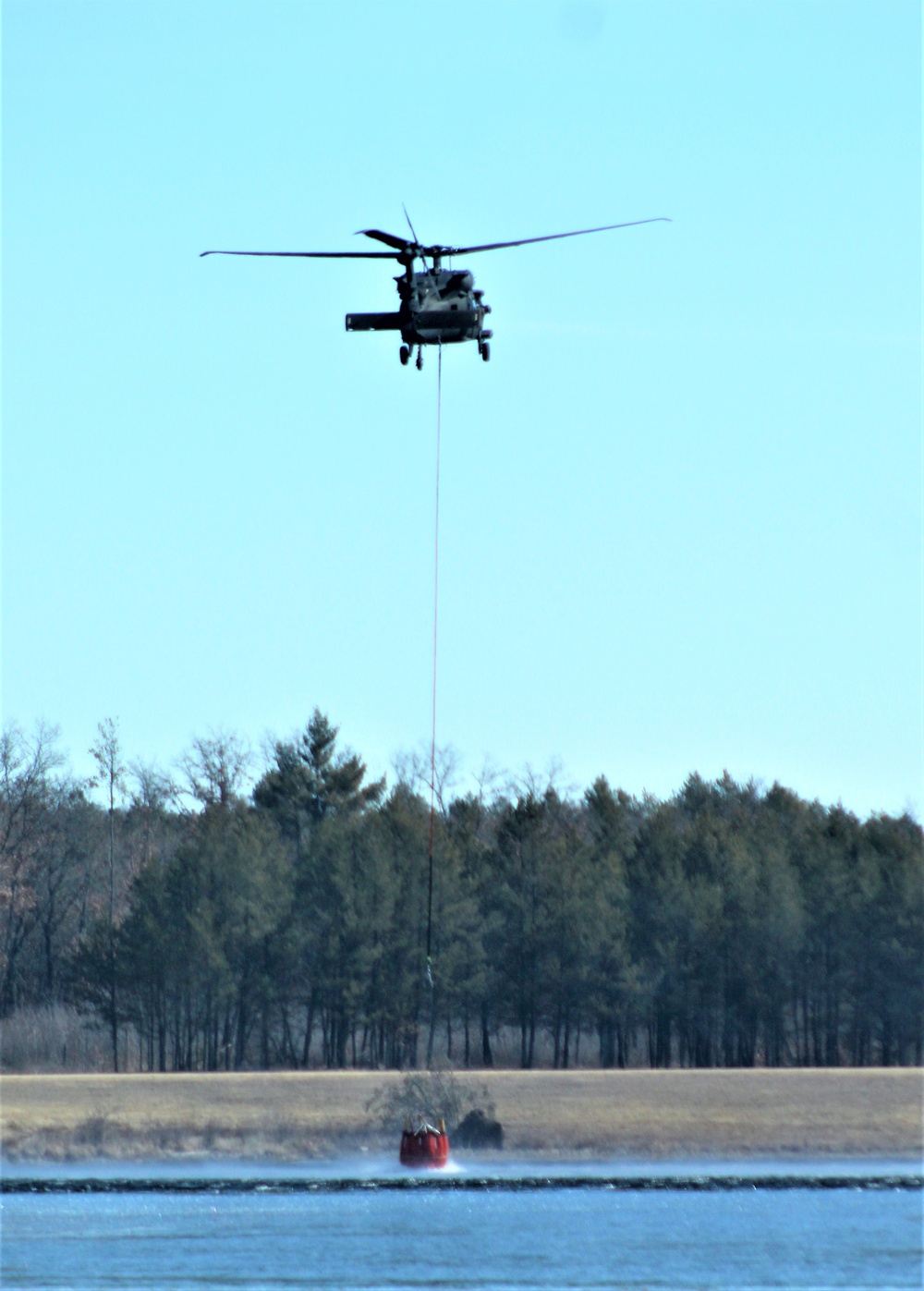 Federal, state agencies partner for fire-suppression training with UH-60 Black Hawks at Fort McCoy