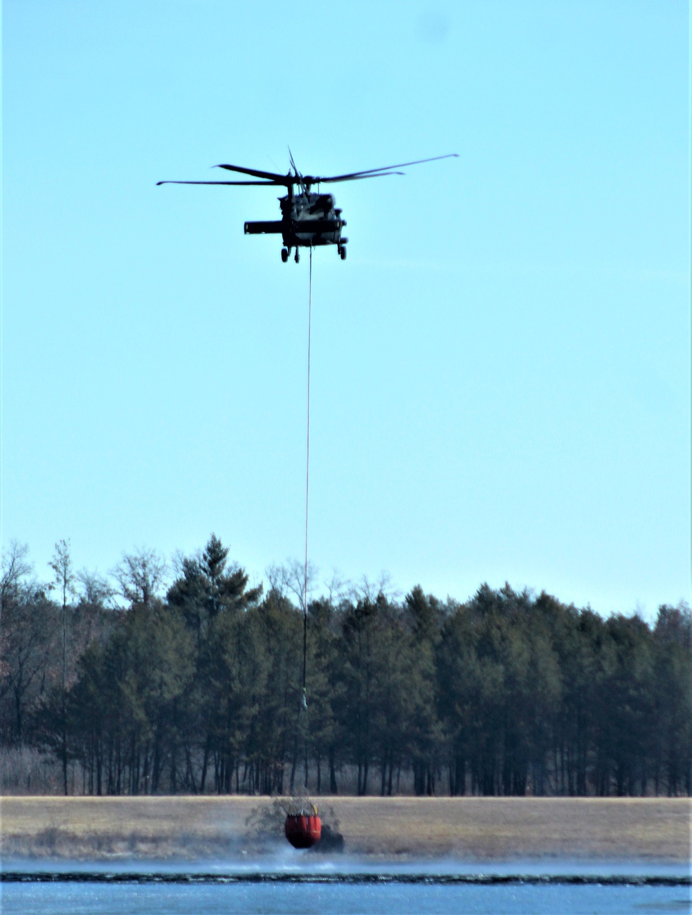 Federal, state agencies partner for fire-suppression training with UH-60 Black Hawks at Fort McCoy