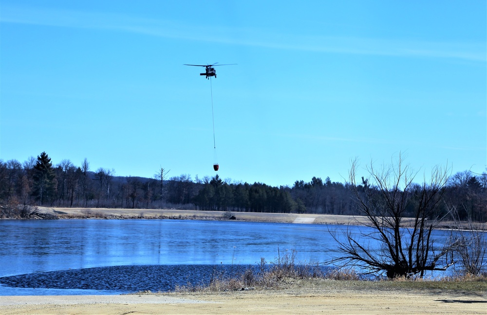 Federal, state agencies partner for fire-suppression training with UH-60 Black Hawks at Fort McCoy