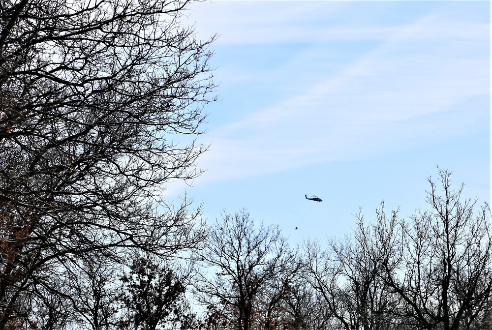 Federal, state agencies partner for fire-suppression training with UH-60 Black Hawks at Fort McCoy