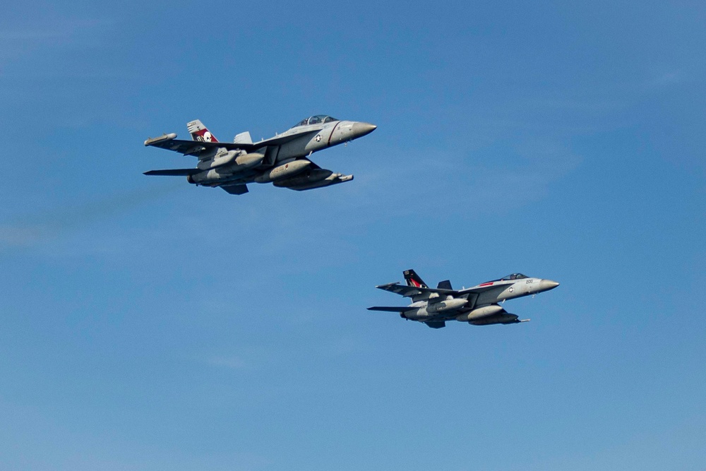 Abraham Lincoln holds a change of command in-flight ceremony for CVW-9