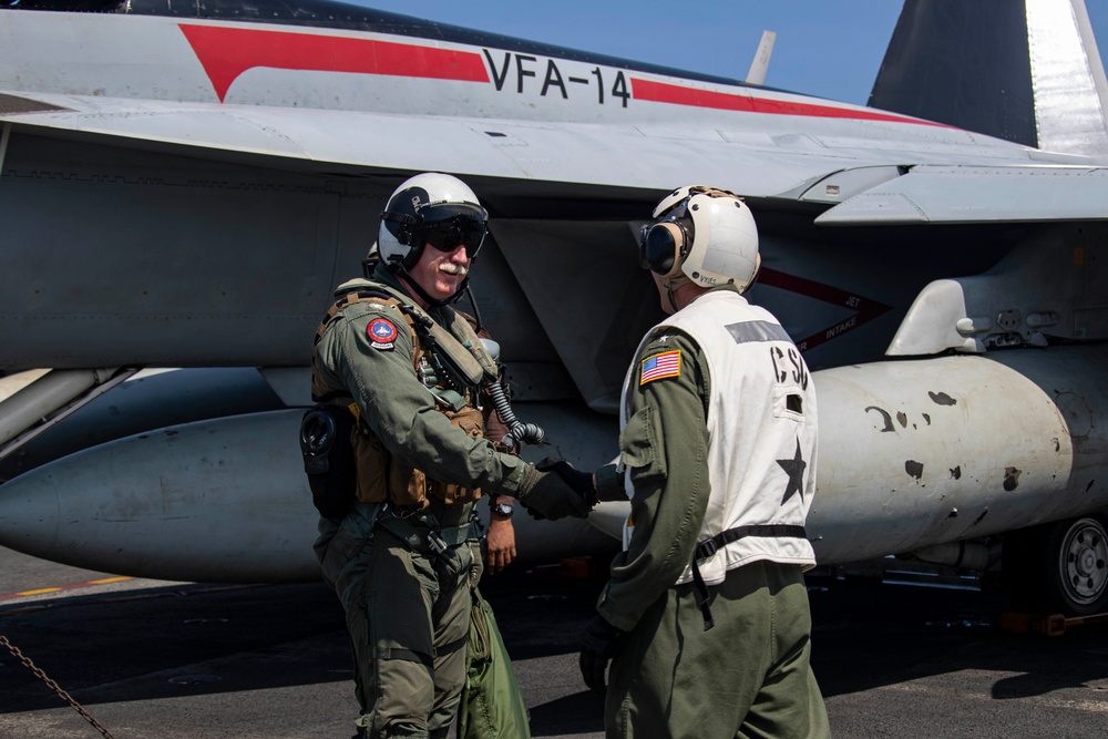 Abraham Lincoln holds a change of command in-flight ceremony for CVW-9