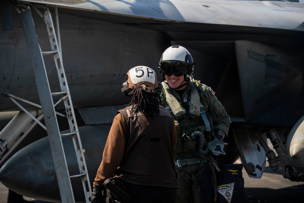 Abraham Lincoln holds a change of command in-flight ceremony for CVW-9