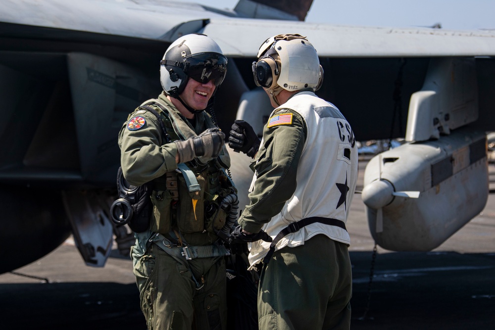 Abraham Lincoln holds a change of command in-flight ceremony for CVW-9