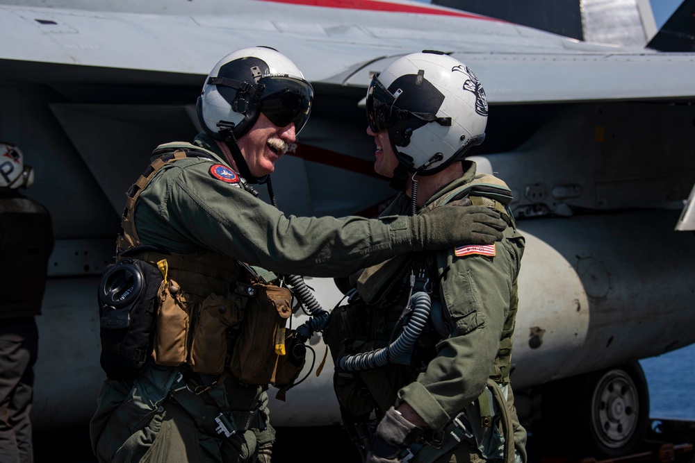 Abraham Lincoln holds a change of command in-flight ceremony for CVW-9