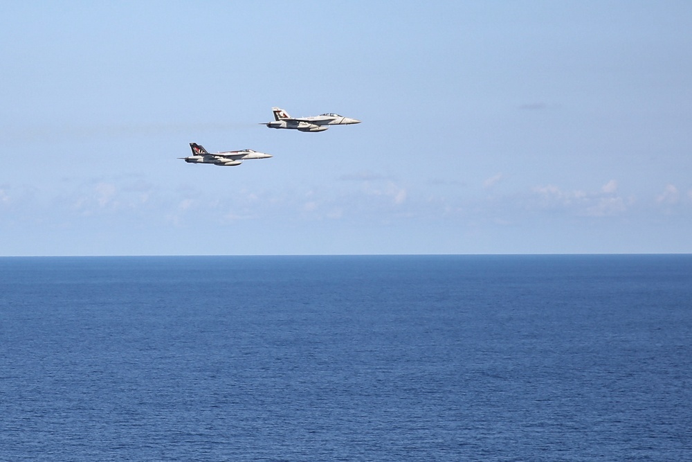 Abraham Lincoln holds a change of command in-flight ceremony for CVW-9