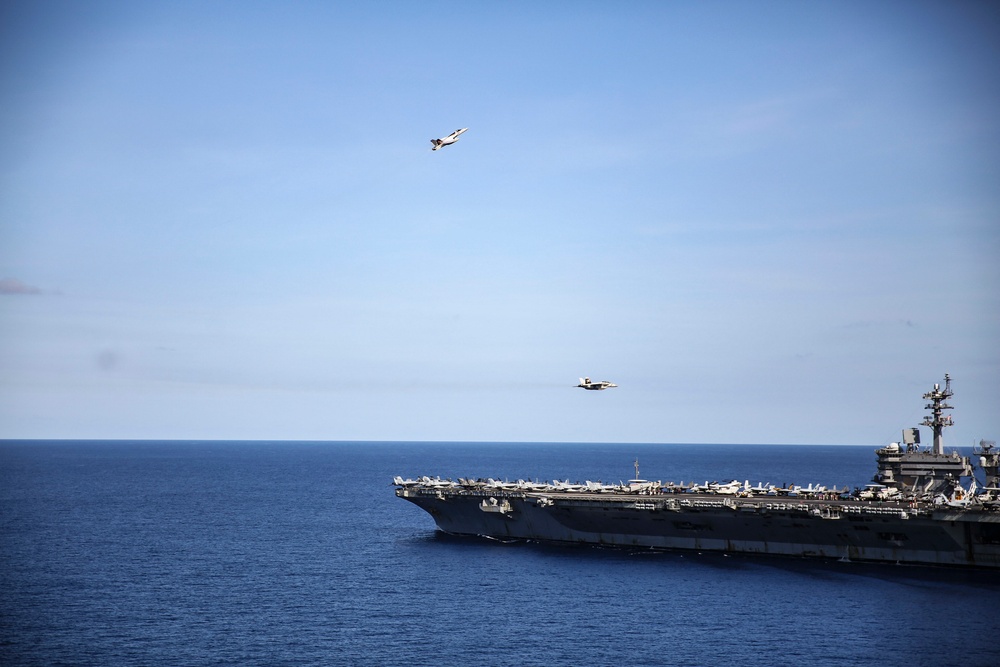 Abraham Lincoln holds a change of command in-flight ceremony for CVW-9