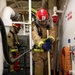 USS Ross Sailors hold main space fire drill