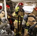 USS Ross Sailors hold main space fire drill