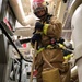 USS Ross Sailors hold main space fire drill