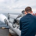 Gunner’s Mate 3rd Class Sebastian Demarais, from Portsmouth, Va., fires an air slug from a Mark-32 surface vessel torpedo tube