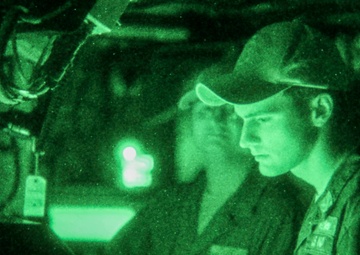 Information Technician Mans the Helm on Higgins