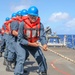 Sailors Hold Line Aboard USS Higgins