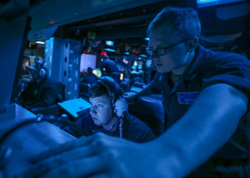 Fire Controlmen Monitor Surface Contacts From USS Higgins