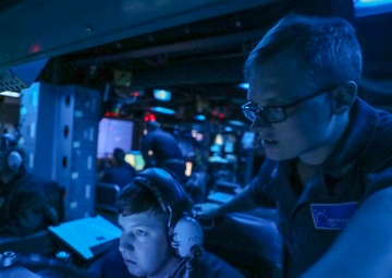 Fire Controlmen Monitor Surface Contacts From USS Higgins