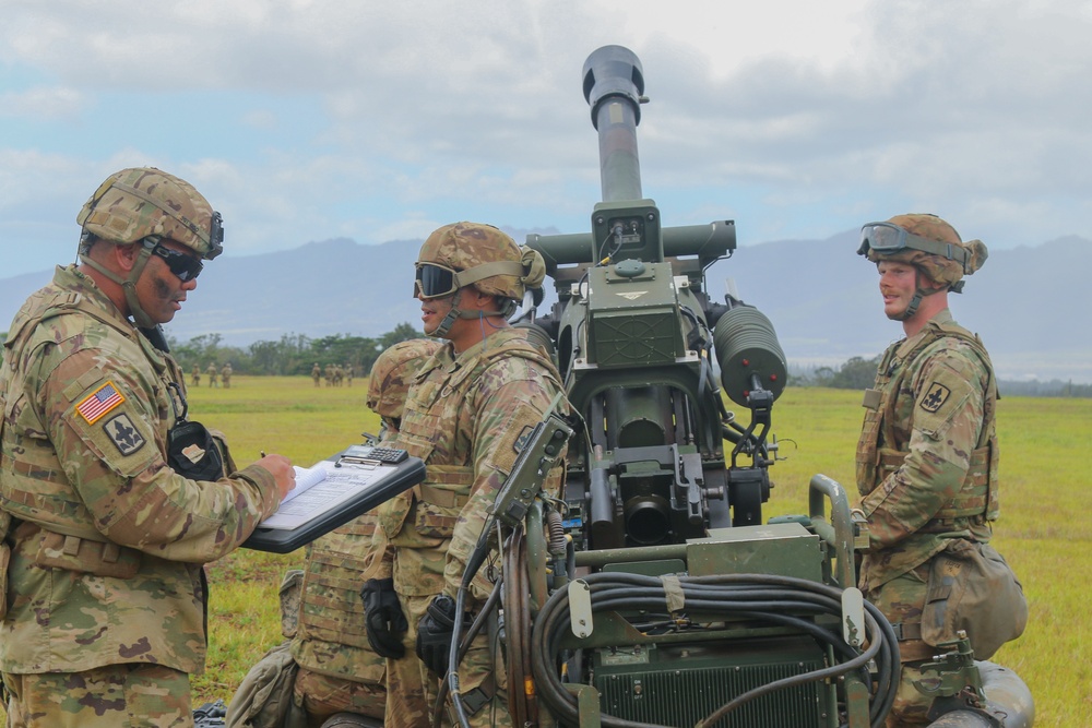 Hawaii Army National Guard 211th Aviation Regiment and 1-487th Field Artillery Sling Load Training