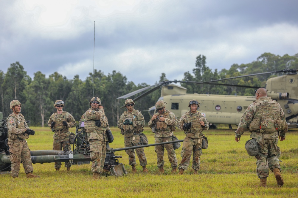 Hawaii Army National Guard 211th Aviation Regiment and 1-487th Field Artillery Sling Load Training