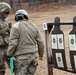 410 MLC soldier observes shot group during weapons training