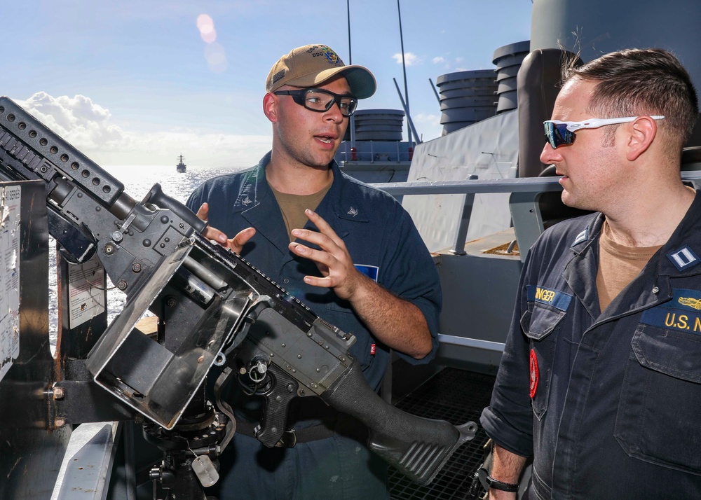 Sailors Discuss Training on Bridgewing of USS Higgins