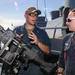 Sailors Discuss Training on Bridgewing of USS Higgins