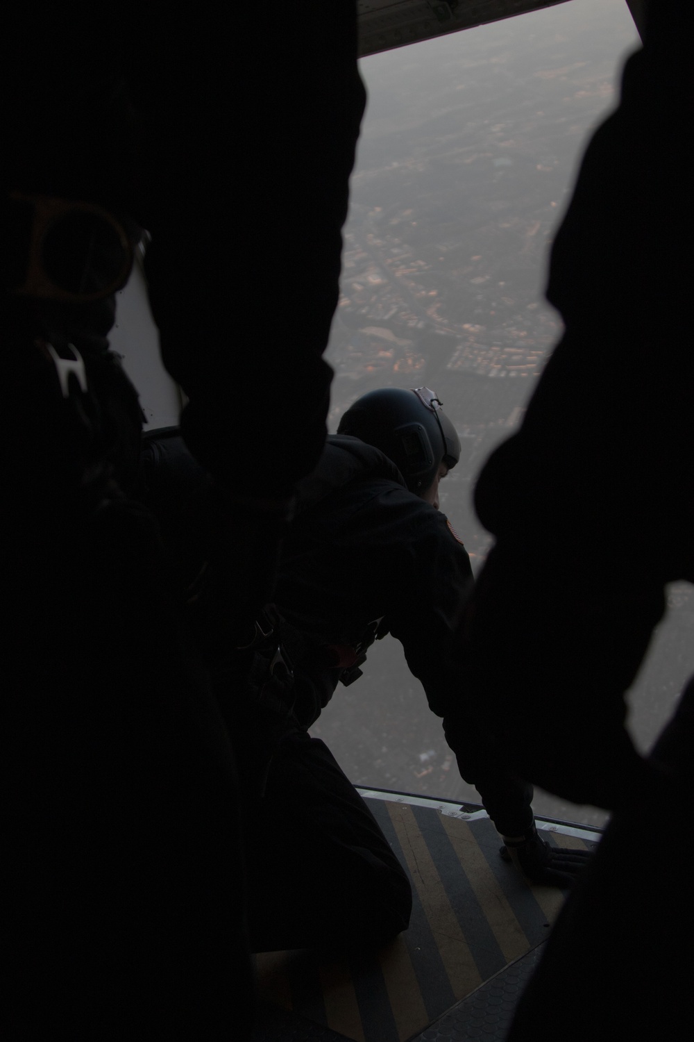 U.S. Army Parachute Team, the Golden Knights, jump into the San Antonio Country Club.