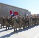 Soldiers receive the Norwegian foot march badge and certificate