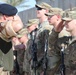 Soldiers receive the Norwegian foot march badge and certificate