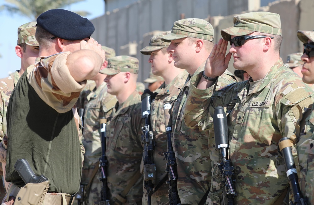 Soldiers receive the Norwegian foot march badge and certificate