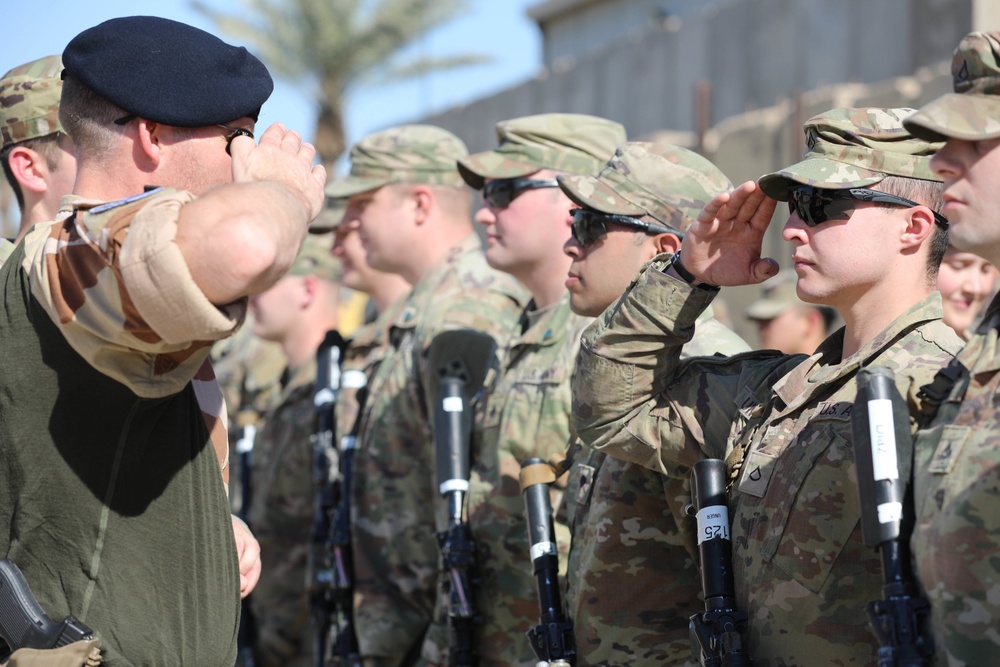 Soldiers receive the Norwegian foot march badge and certificate