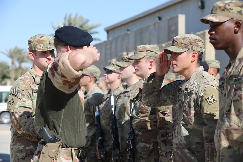 Soldiers receive the Norwegian foot march badge and certificate