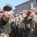 Soldiers receive the Norwegian foot march badge and certificate