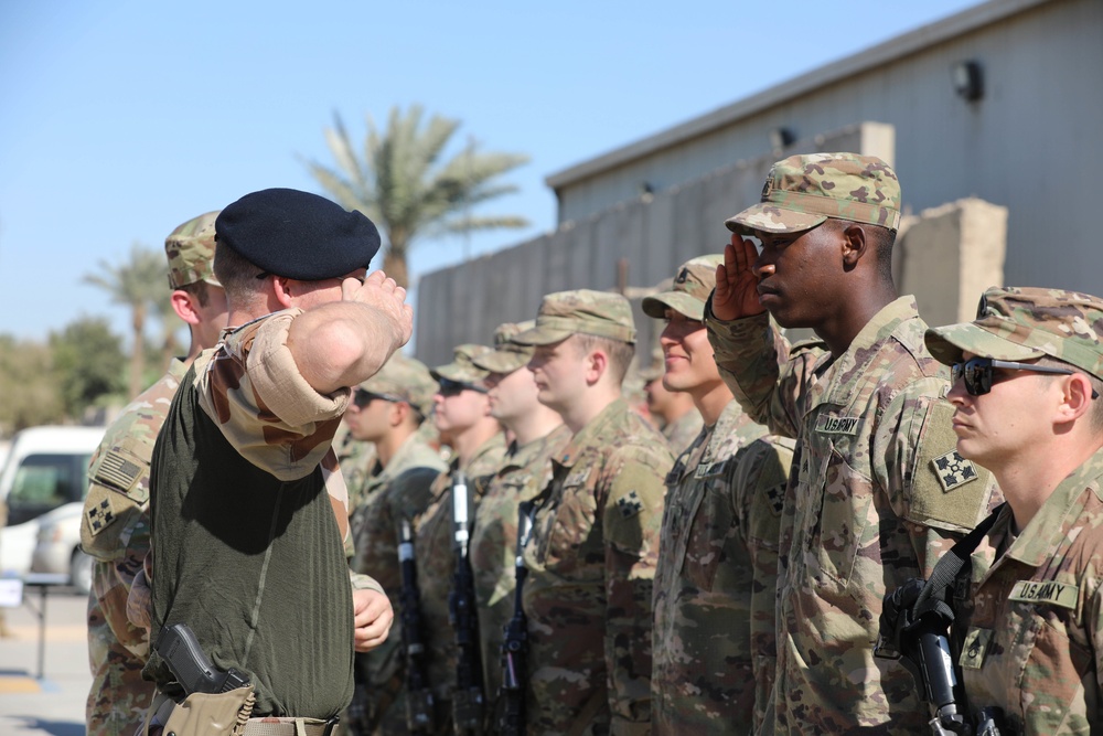 Soldiers receive the Norwegian foot march badge and certificate