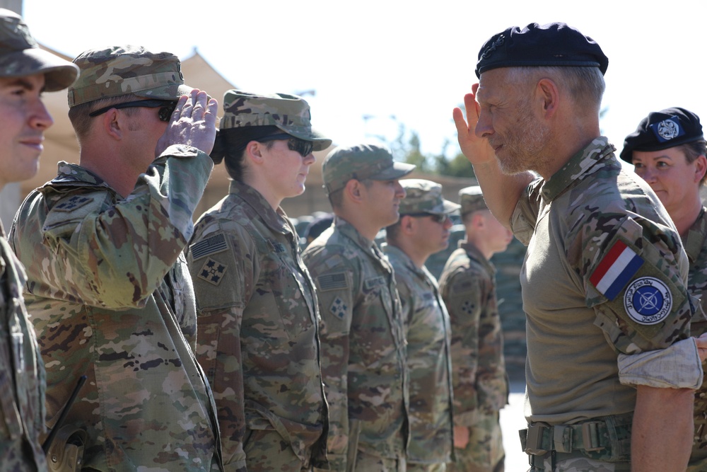 Soldiers receive the Norwegian foot march badge and certificate