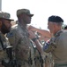 Soldiers receive the Norwegian foot march badge and certificate